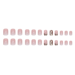 Short square press-on nails with pink gradient, French glitter tips, and shiny rubies