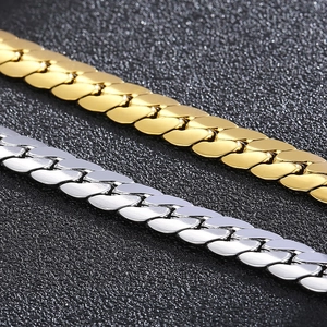 Fashionable gold and silver stainless steel curb chain bracelets for a modern business style