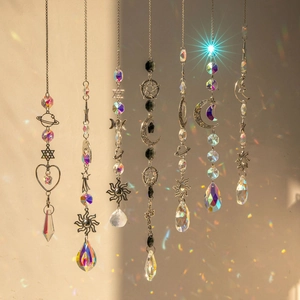 Silver suncatchers set with moon and star metal charms and crystal prisms for home decor