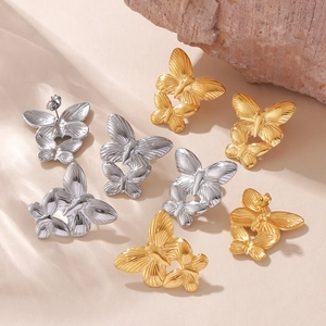 Exaggerated floral butterfly earrings in 18k gold and silver titanium steel