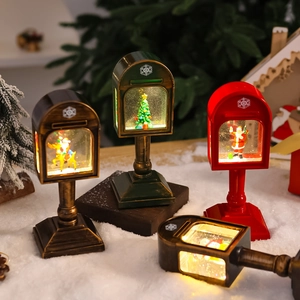Lighted Christmas mailbox snow globe with Santa and reindeer scene, warm LED desk lamp