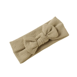 Khaki ribbed knit baby headband with textured bow accessory for toddlers and infants