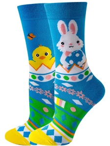 Detail of blue Easter socks featuring cartoon bunnies, chicks, and colorful eggs patterns