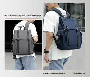 Front view of grey and navy blue business backpacks with double buckle flap closure