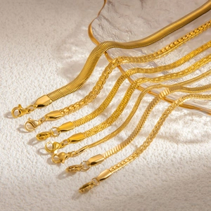 Detail of 18k gold plated snake chain and flat blade chain with lobster clasp for women