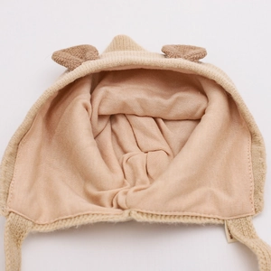 Knitted baby earflap hat with soft lining and cute 3D ears in beige color
