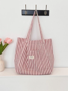 French style red and white striped canvas tote bag hanging with pink tulip decor