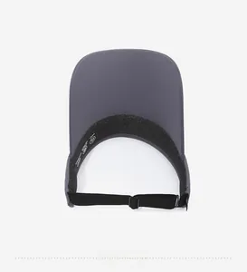 Detail view of the gray sun hat interior with UPF 50+ label and black sweatband