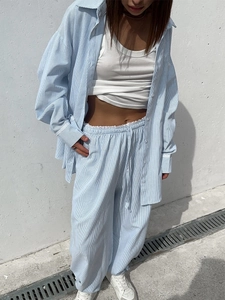 Women's blue and white striped oversized shirt and drawstring pants two-piece set