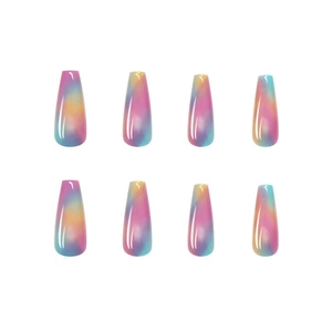 Detail of long trapezoid fake nails with colorful pink yellow blue purple gradient finish