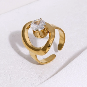 Detailed macro shot of 18k gold plated stainless steel ring with a large zircon stone