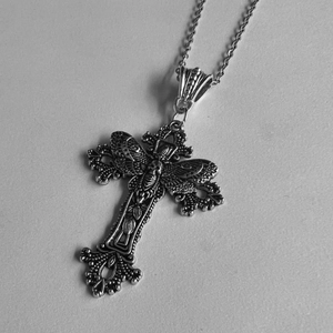 Gothic punk silver metal cross necklace with intricate embossed patterns and hollow details