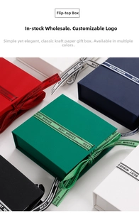 Multiple flip-top jewelry boxes in various colors with elegant silk ribbons