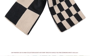 Macro shot of classic black and white checkerboard knit texture with dense stitching