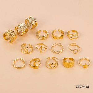 14-piece stackable 18k gold plated stainless steel ring set with adjustable sun and star motifs