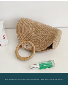 Close-up of the intricate spiral woven texture on a beige cotton rope tote bag