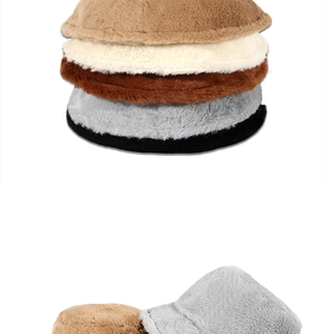Detailed view of plush faux rabbit fur bucket hats in brown, cream, grey, and black colors