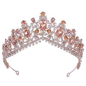 Detailed macro view of rose gold bridal crown with champagne crystals and rhinestones