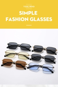 Detail of square vintage sunglasses with metallic chain textured temples and CE marking