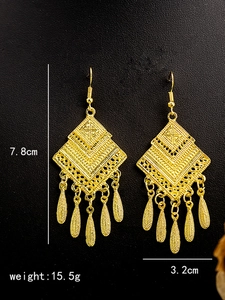 Ethnic gold hollow rhombus drop earrings with teardrop tassels and 7.8cm size detail