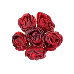 Set of six vintage red artificial rose heads with burnt edge detail on white background