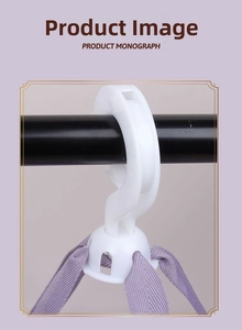 Detail of detachable white plastic hook with purple woven strap for beauty tool drying