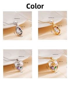 Artistic vintage heart and oval pendants with enamel flowers and colorful gemstones