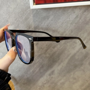 Classic large black frame anti-blue light glasses with silver arrow rivets and blue lenses