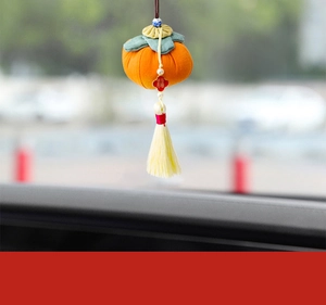 Detailed fabric persimmon car hanging ornament with festive silk tassel and Fu tag