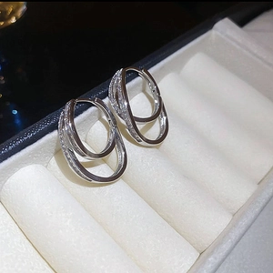 Elegant 18k gold plated double layer hoop earrings with zircon stones on white display