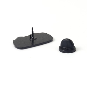 Detail view of durable black matte metal brooch pin back with secure rubber clutch back