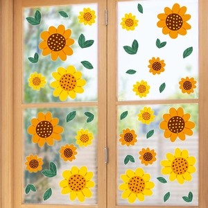 Yellow sunflower and green leaf PVC window stickers on a wooden glass frame