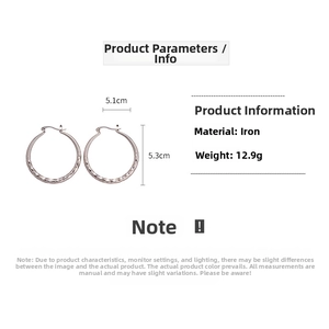 Detail view of geometric diamond-patterned silver hoop earrings with size specifications