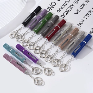 Sparkling rhinestone perfume atomizer bottle with metallic keychain and clear level window