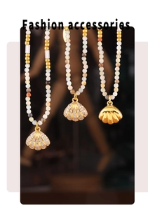 Detail of bohemian shell necklaces with natural stones and sparkling zircon accents