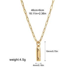 Detail view of gold bubble letter necklace with 46cm chain and 19x4mm pendant dimensions