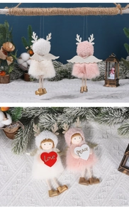 Detail of plush Christmas angel ornaments with antlers, wings and Love heart signage