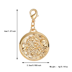Detail of tarot pendant showing 4cm height dimensions and sun-moon embossed pattern