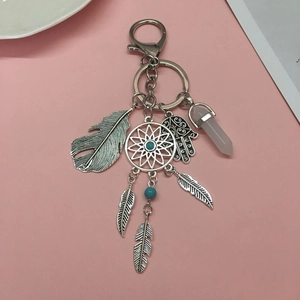 Bohemian dreamcatcher keychain with feathers Hamsa hand and pink crystal pendant