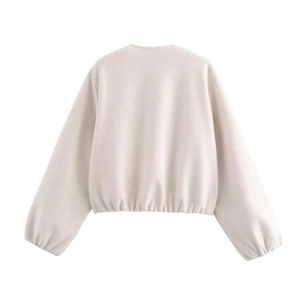Vue arrière d'un blouson aviateur court beige doux avec poignets et ourlet côtelés