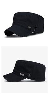 Detail view of cotton cadet cap with metal vents and engraved rectangular logo tag