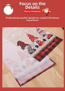 Detail of Christmas table runner with festive gnomes and Merry Christmas print