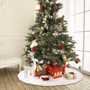 Luxurious white faux fur Christmas tree skirt with festive holiday decor and gift boxes