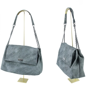 Grey textured crossbody bag displayed on a gold T-shaped metal jewelry display rack