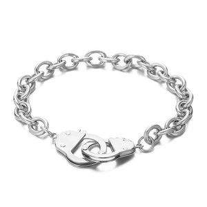 Minimalist silver stainless steel handcuff link bracelet with a polished metal finish