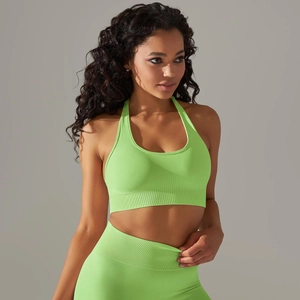 Detail of lime green seamless knitted sports bra and high-waist yoga leggings set