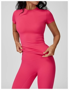 Hot pink quick-dry yoga set featuring slim fit T-shirt and high waist leggings for fitness