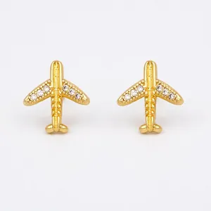 Creative gold airplane stud earrings with sparkling crystals for a trendy flight look