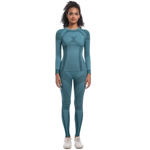 Detail of teal seamless workout set featuring breathable mesh vents and ribbed support