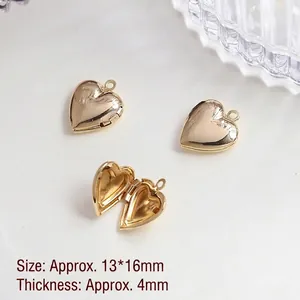 Macro detail of heart-shaped gold photo locket showing interior and mirror polish